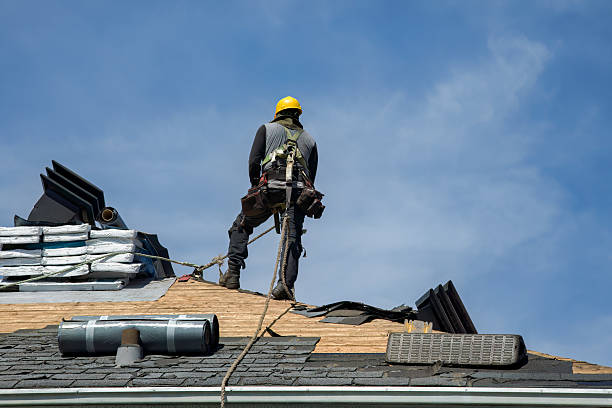 Professional Gutter Installation technician working in Mashpee, MA